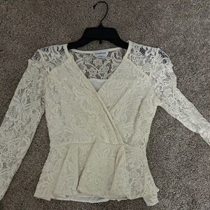 bebe Cream Lace Peplum Wrap Top